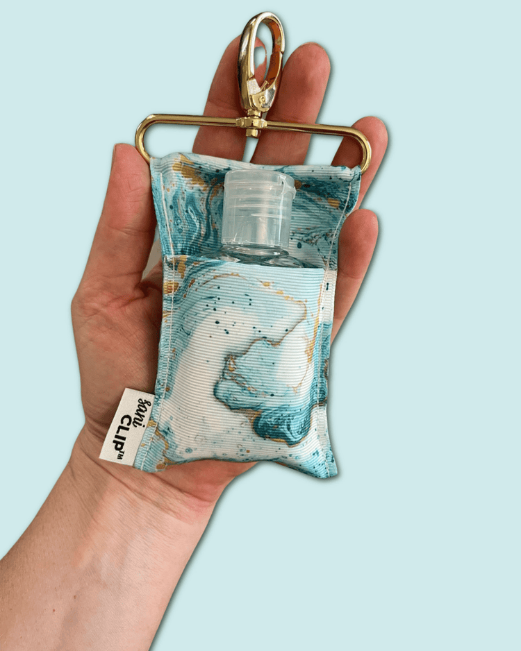 SaniClip™ Hand Sanitizer Holder